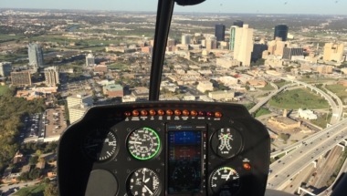 Training helicopter flying over downtown Fort Worth